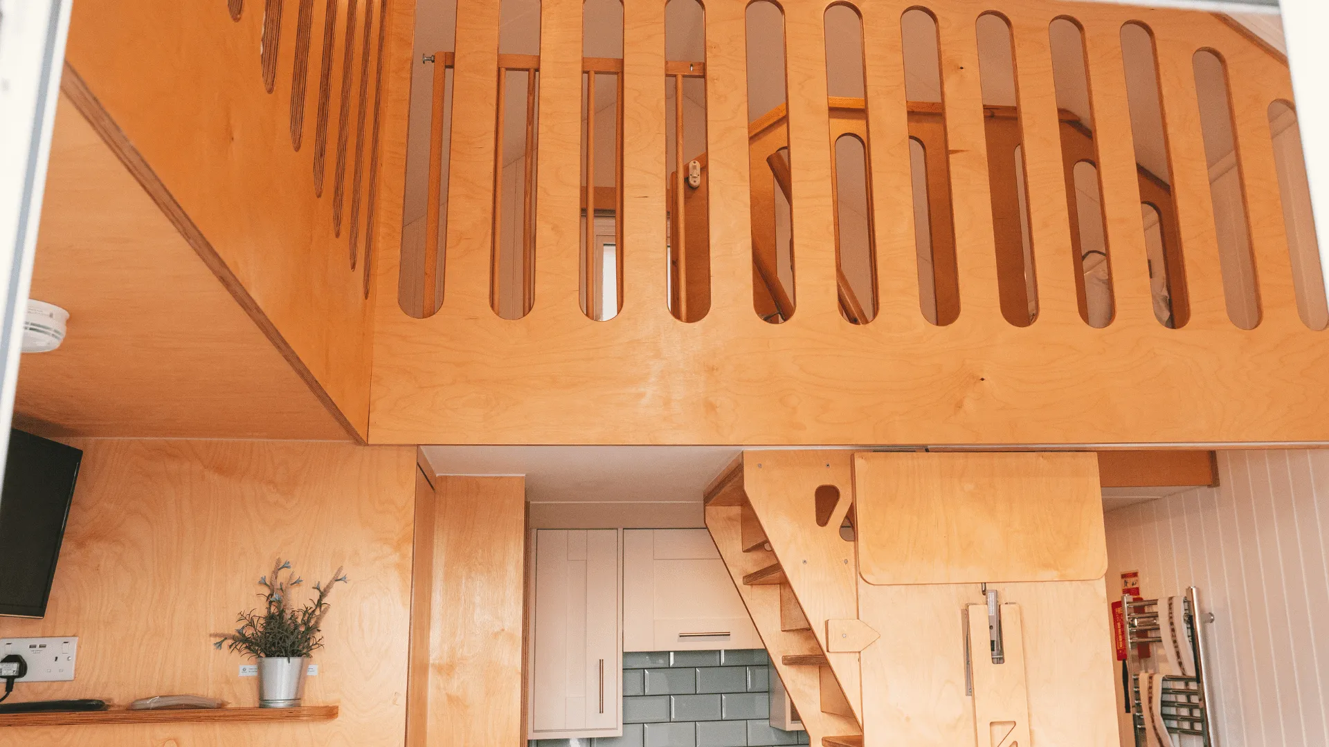 First floor wooden staircase with railings