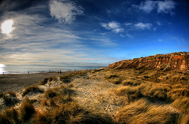 Blue skies over the sandy grasslands at Hengistbury Head