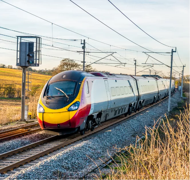 Train whizzing by the open fields